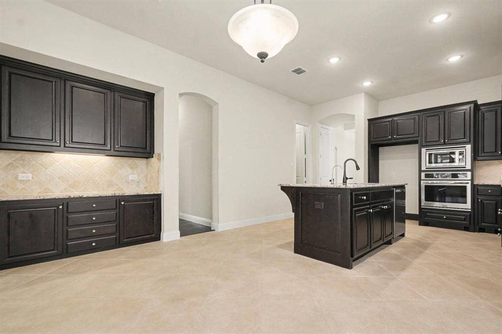 Open Floor Plan. View of Family Room from Kitchen