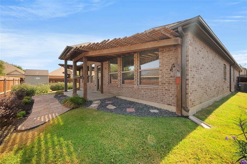 231 Carson Drive, Waxahachie, TX 75167 Storage shed is 8x7. The fence has gates on both sides of the home