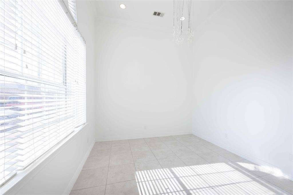 2840 Keller Springs Road, #1201, Carrollton, TX 75006 Recessed lighting, tile flooring, high ceilings, a decorative chandelier, and window blinds