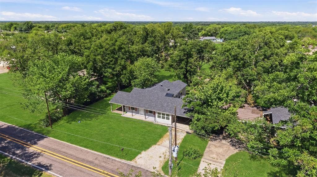 337 N 1st Street, Point, TX 75472 Ranch-style residence featuring a covered front porch with white columns