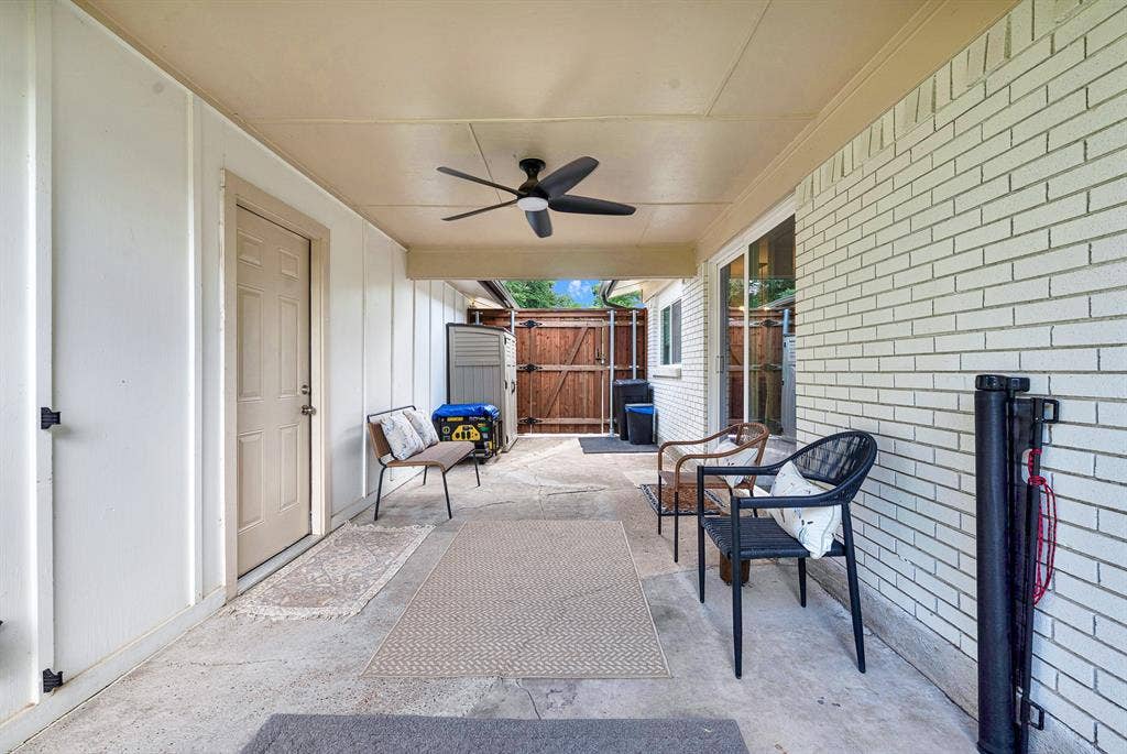 745 Pinehurst Drive, Richardson, TX 75080 Breezeway between house and garage, currently furnished as TV & entertainment area