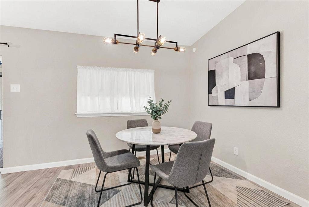 745 Pinehurst Drive, Richardson, TX 75080 Breakfast area off kitchen - virtually staged