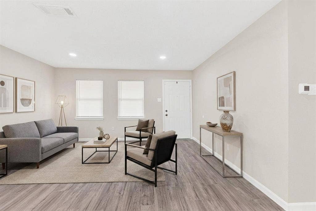 745 Pinehurst Drive, Richardson, TX 75080 Entry and additional living space - virtually staged