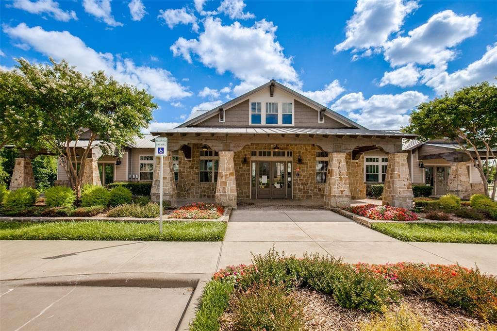 1006 Emil Place, Allen, TX 75013 Craftsman-style facade featuring stone columns and siding accents
