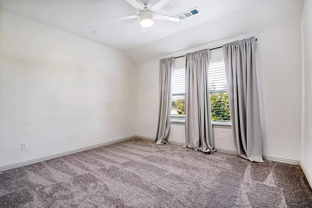 1006 Emil Place, Allen, TX 75013 Spacious room featuring textured gray carpeting and white painted walls