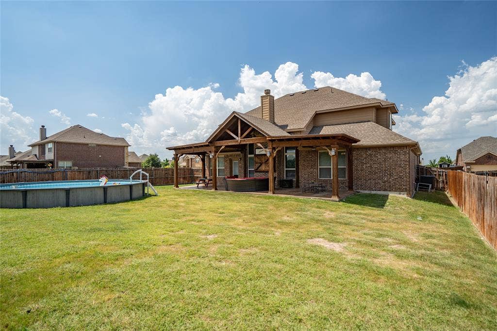 2101 Trinity Lane, Wylie, TX 75098 Features above ground pool.