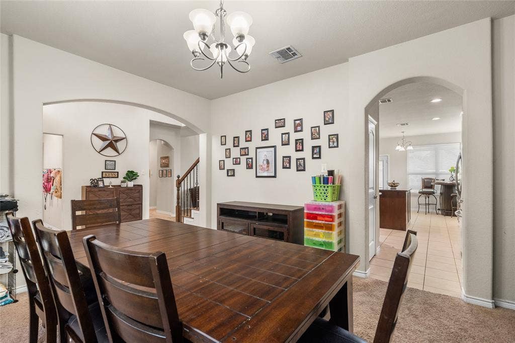 2101 Trinity Lane, Wylie, TX 75098 Dining area features arched doorways.