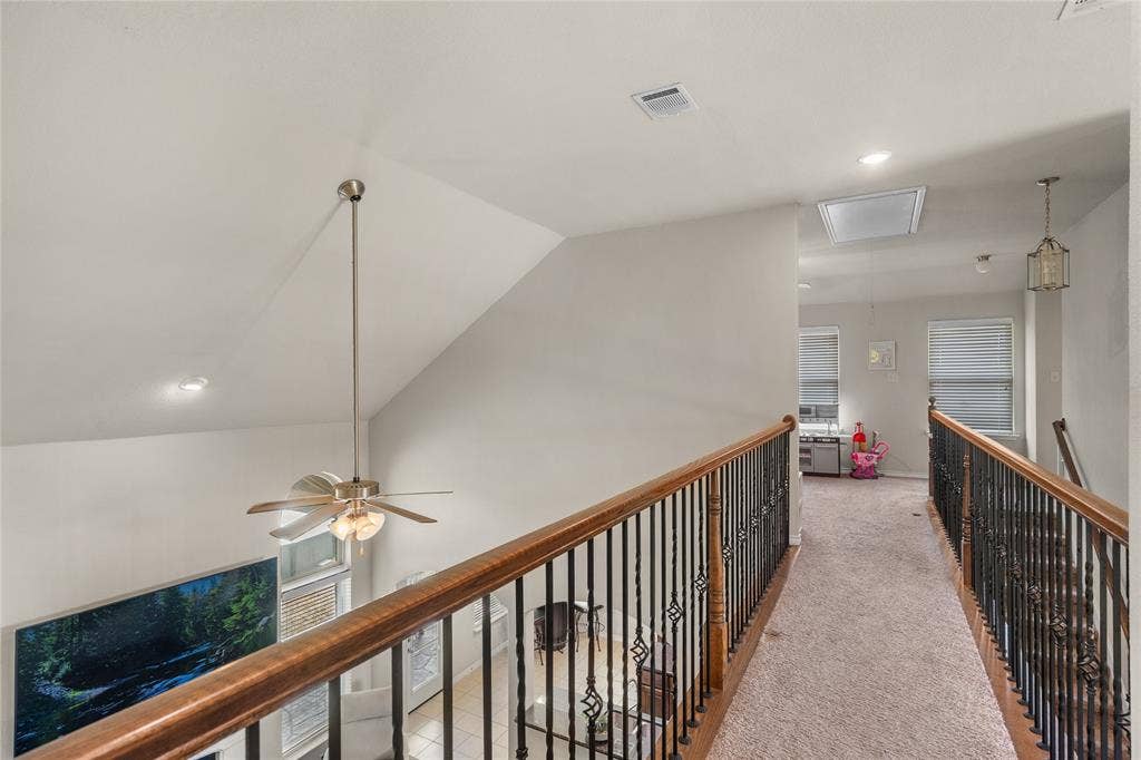 2101 Trinity Lane, Wylie, TX 75098 Upstairs hall separates bedrooms and game rooms.