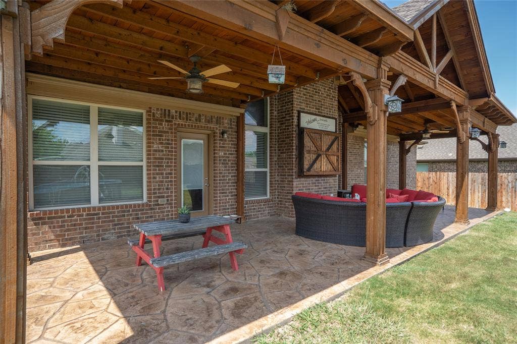 2101 Trinity Lane, Wylie, TX 75098 Covered porch area is equipped with TV, perfect for outdoor movies.