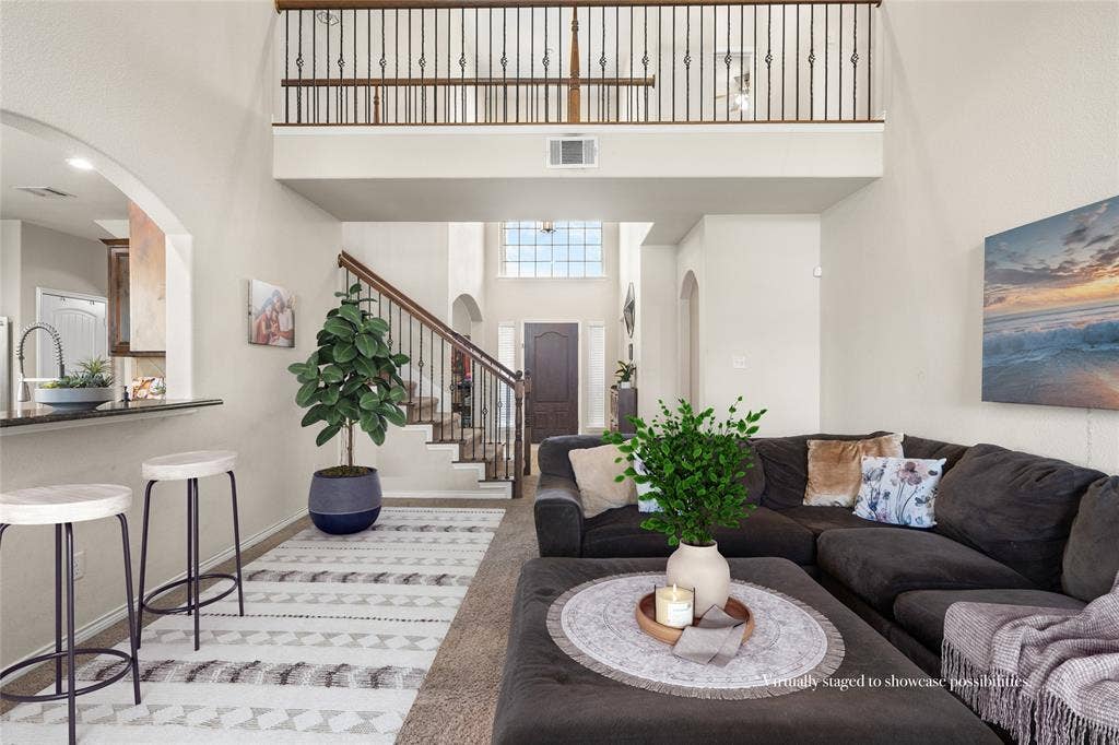 2101 Trinity Lane, Wylie, TX 75098 Open style living area. Virtually staged to showcase possibilities.