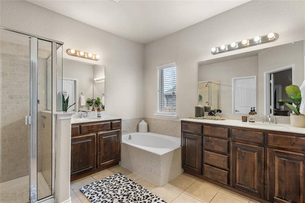 2101 Trinity Lane, Wylie, TX 75098 Ensuite primary bathroom features garden tub and separate shower.