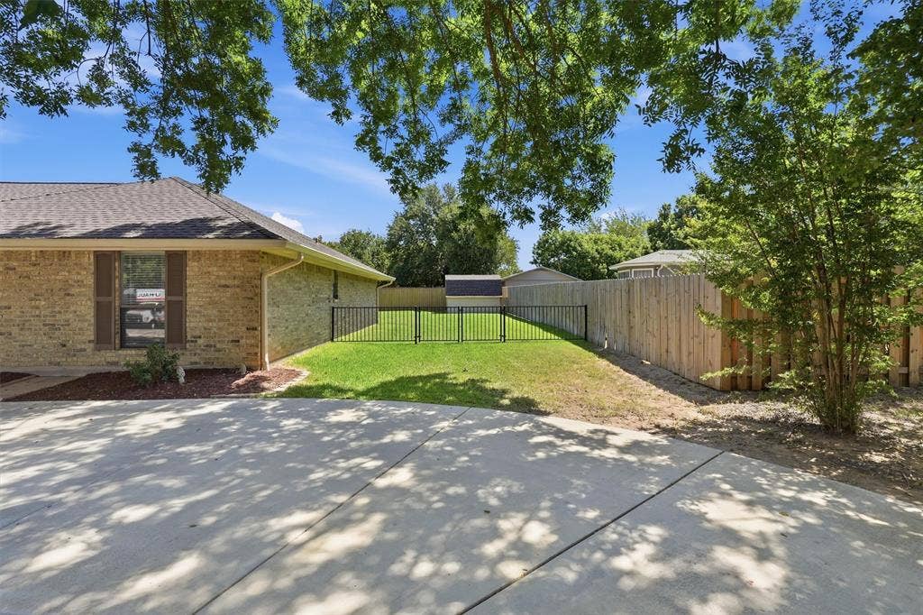 5711 Cortez Drive, Granbury, TX 76049 Large side yard to park a camper or boat
