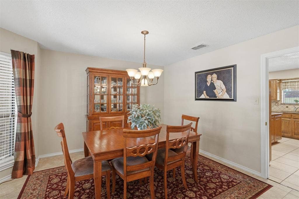 5711 Cortez Drive, Granbury, TX 76049 Dining area featuring neutral wall tones and a ceiling-mounted light fixture