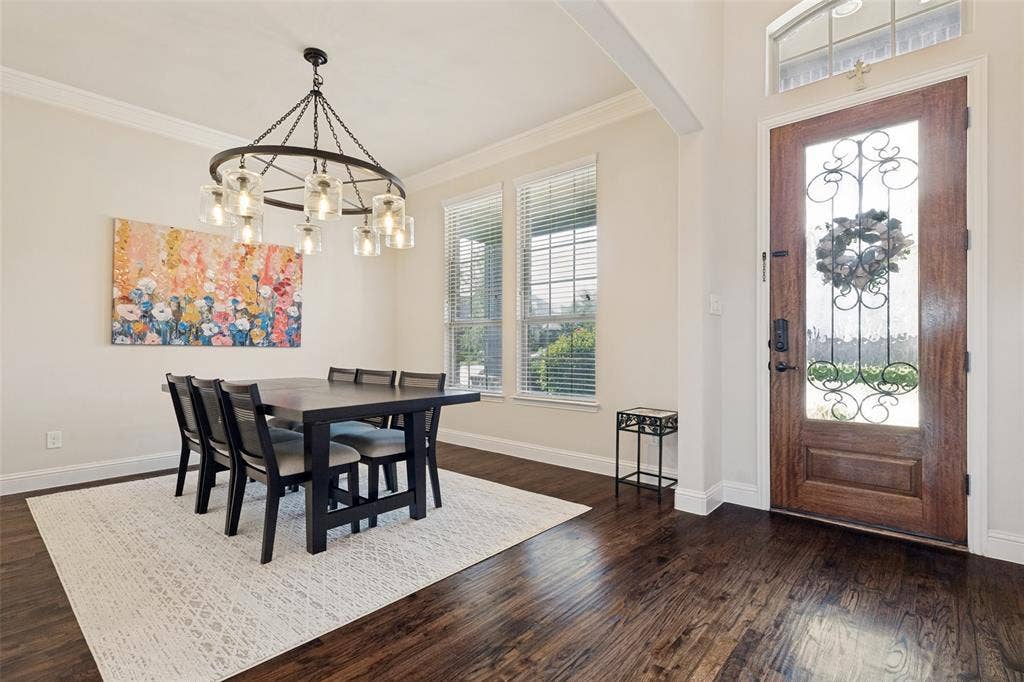 6409 Biltmore Lane, McKinney, TX 75071 Rich hardwood floors in Dining Room into Living