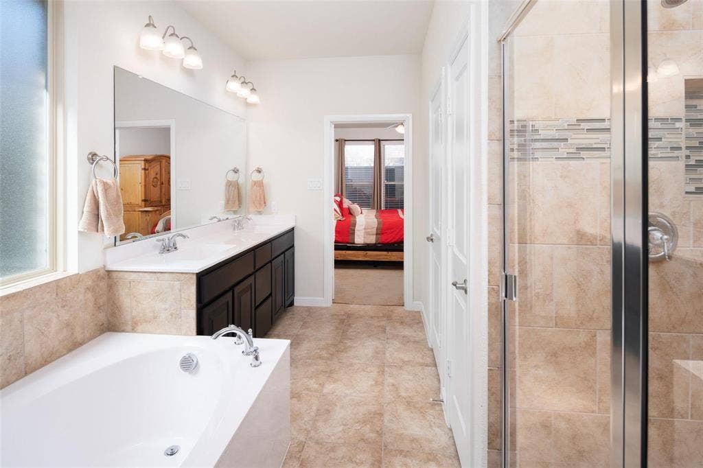 The photos were taken while the home was occupied. The furniture shown in the photos is for staging purposes only and is not included with the sale of the home.