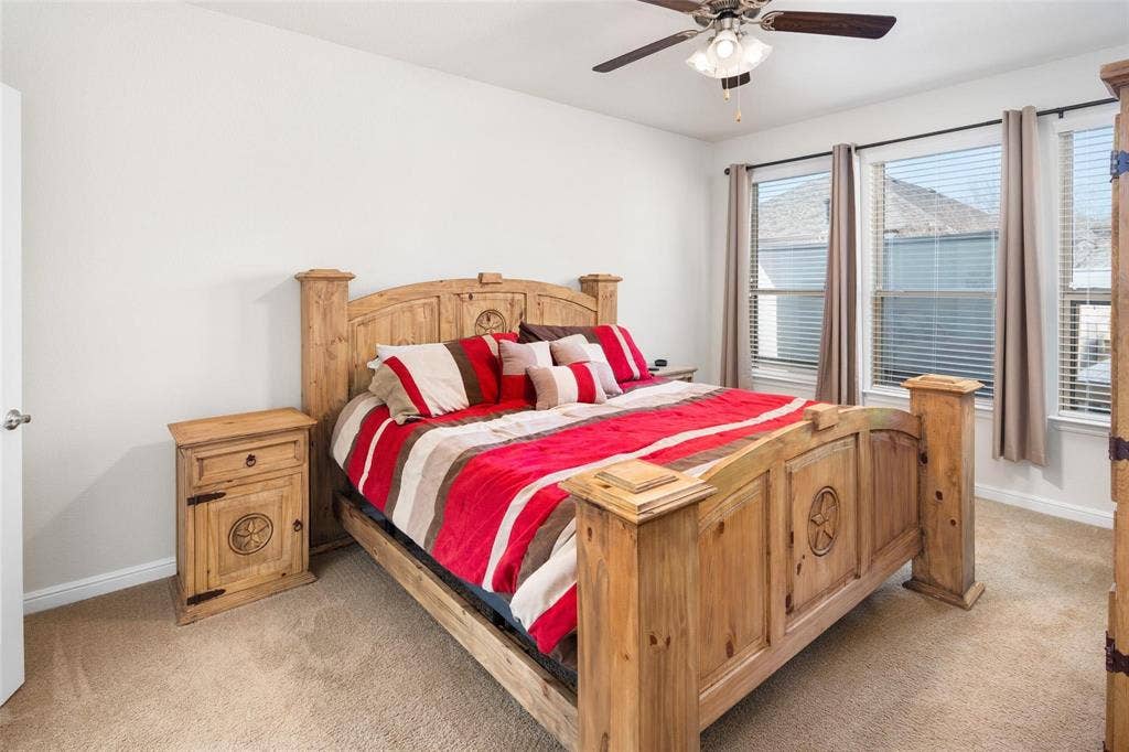 The photos were taken while the home was occupied. The furniture shown in the photos is for staging purposes only and is not included with the sale of the home.