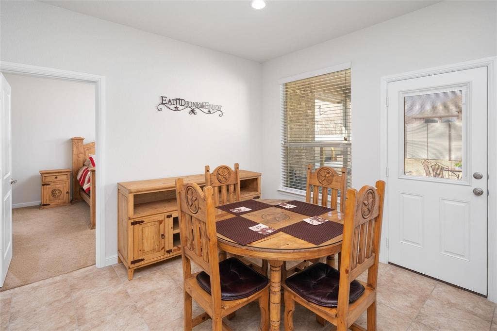 The photos were taken while the home was occupied. The furniture shown in the photos is for staging purposes only and is not included with the sale of the home.