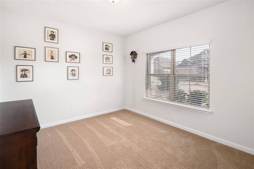 The photos were taken while the home was occupied. The furniture shown in the photos is for staging purposes only and is not included with the sale of the home.
