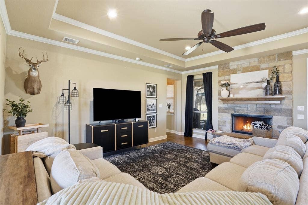 3832 Legend Trail, Granbury, TX 76049 Living space is comfy and cozy.