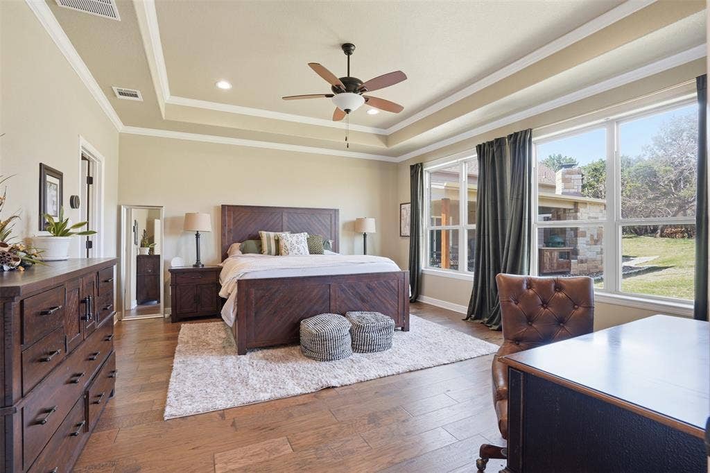 3832 Legend Trail, Granbury, TX 76049 primary bedroom has great space.