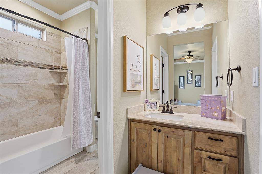 3832 Legend Trail, Granbury, TX 76049 Bedrooms 2 and 3 have a shared full bath.