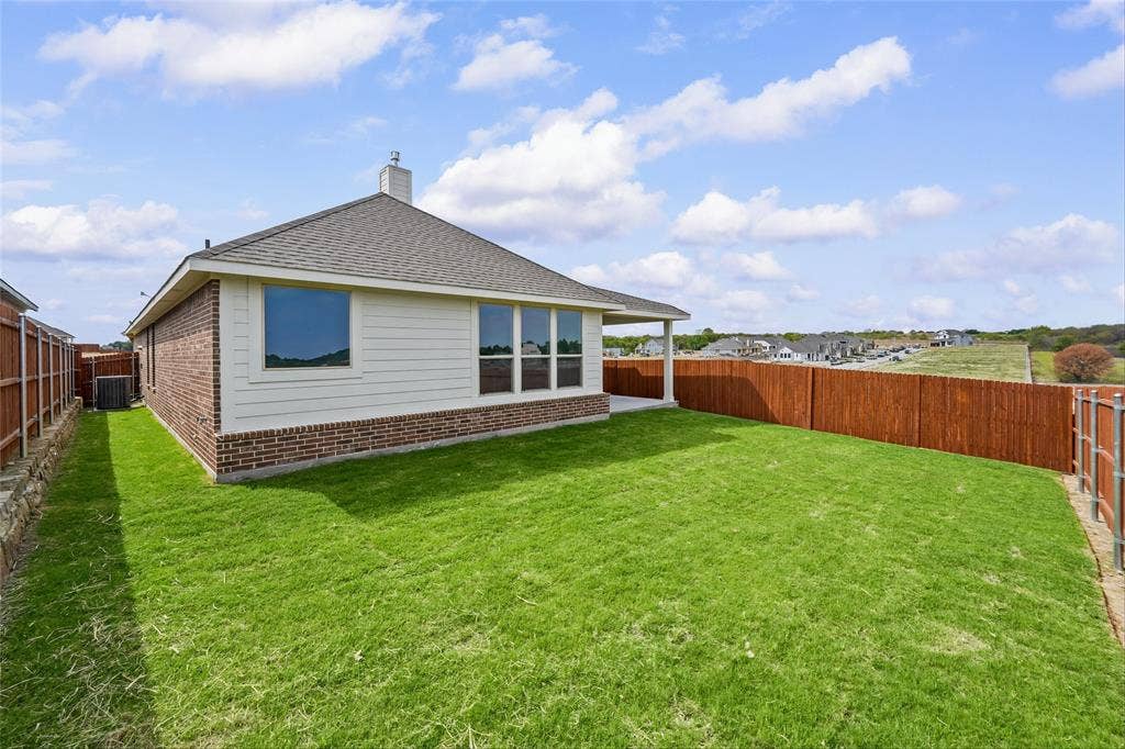 10008 Birchpoint Drive, Fort Worth, TX 76108 Brick exterior with white siding accents