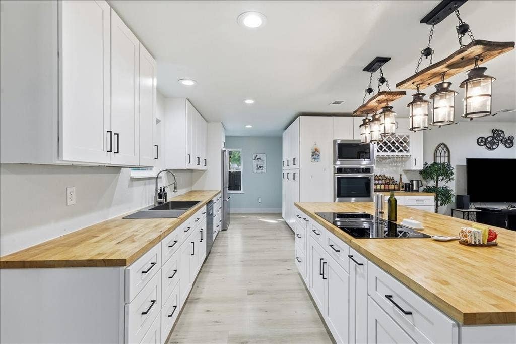 3533 Granada Drive, Richland Hills, TX 76118 view from the eat in dining area. Beautiful newly updated kitchen!