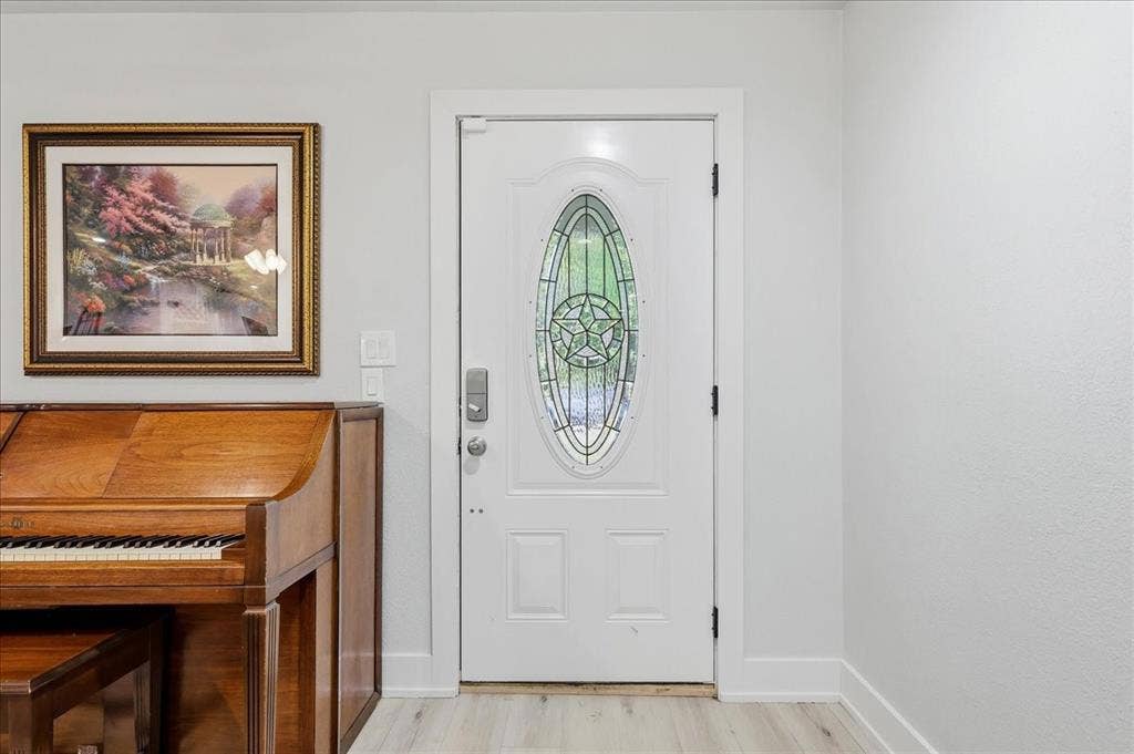 3533 Granada Drive, Richland Hills, TX 76118 Back of the front door as you enter the home.