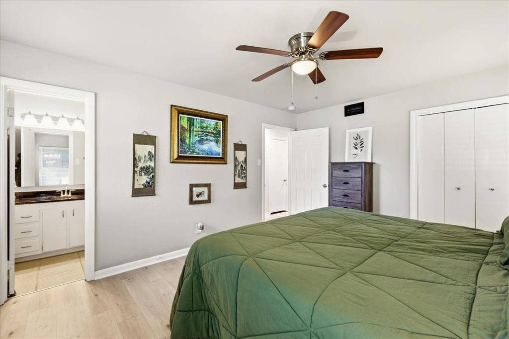 3533 Granada Drive, Richland Hills, TX 76118 primary bedroom and roomie closet.