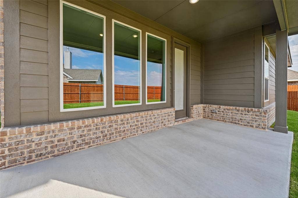 10004 Birchpoint Drive, Fort Worth, TX 76108 Covered patio featuring a concrete surface