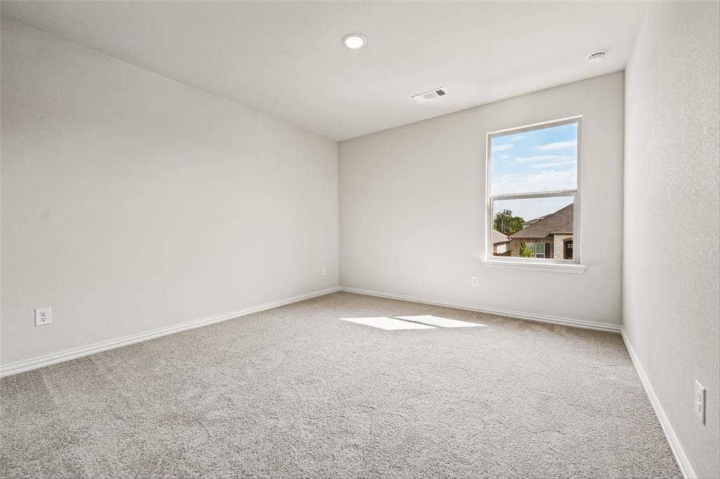 10000 Birchpoint Drive, Fort Worth, TX 76108 Recessed lighting, light-toned carpeting, single window, and light-colored walls