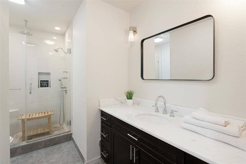 2101 Lyon Court, Plano, TX 75093 Updated hallway bathroom