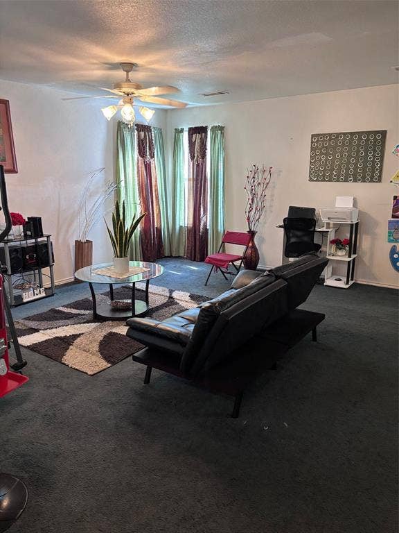 9656 Stonewood Drive, Dallas, TX 75227 Living space featuring dark carpeting