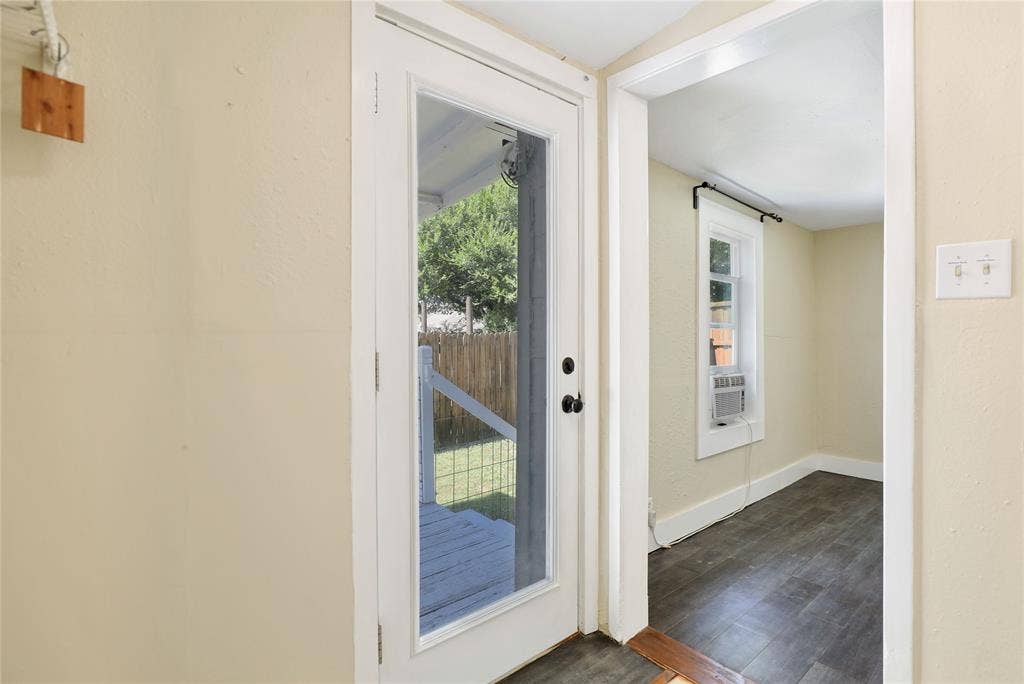 1201 1/2 Cole Street, McKinney, TX 75069 Full-light paneled door providing exterior access