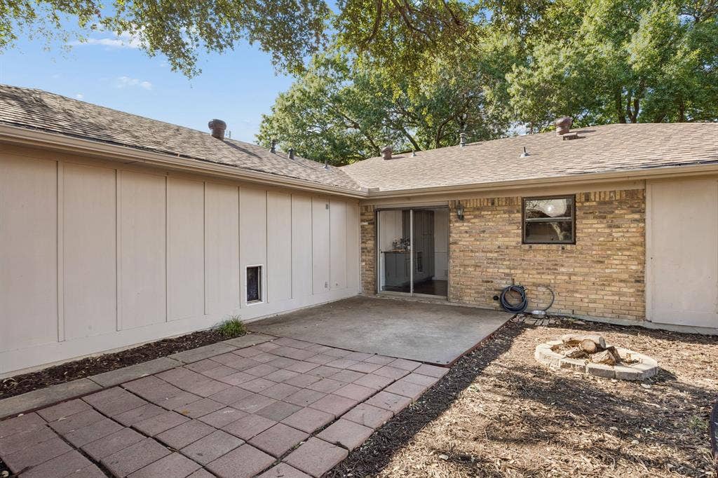 3624 Churchill Lane, Plano, TX 75075 The backyard offers substantial patio space, a mature tree, privacy fencing and room for the next owner to personalize the landscape.