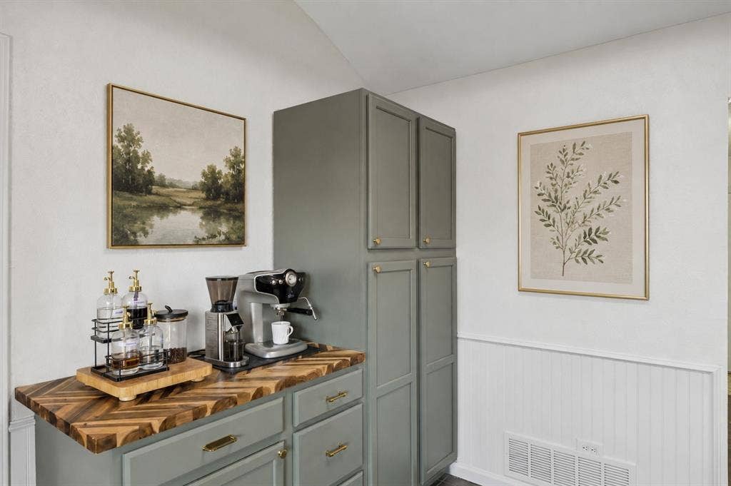 3624 Churchill Lane, Plano, TX 75075 A custom built-in coffee bar combines dedicated beverage service, pantry storage and stylish cabinetry in one thoughtfully designed feature.Virtually Staged -- original image may have been altered by AI.