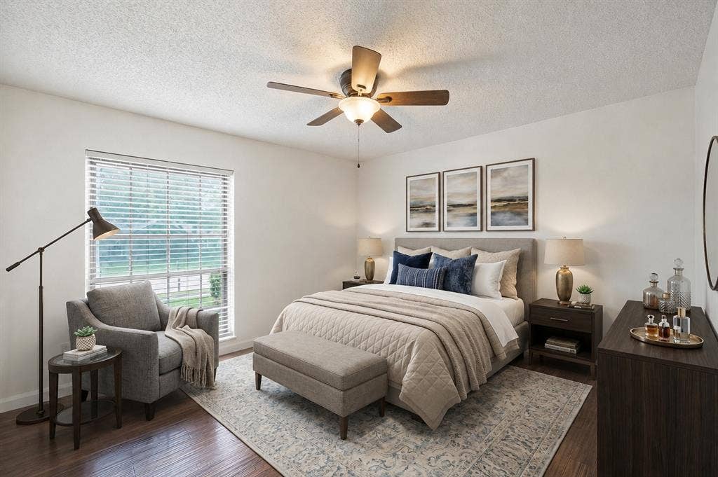 3624 Churchill Lane, Plano, TX 75075 This light-filled secondary bedroom offers flexibility for family, guests, a home office or a creative workspace.Virtually Staged -- original image may have been altered by AI.