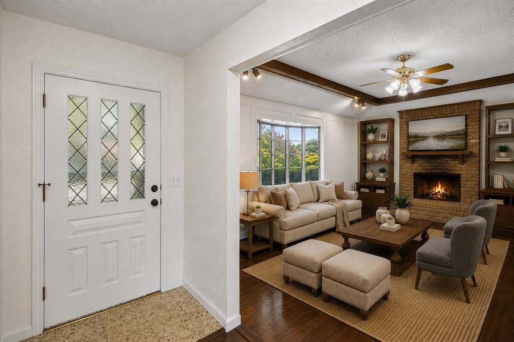 3624 Churchill Lane, Plano, TX 75075 The welcoming entry opens directly into a light-filled family room with hardwood flooring, exposed beams and distinctive architectural character. Virtually Staged -- original image may have been altered by AI.