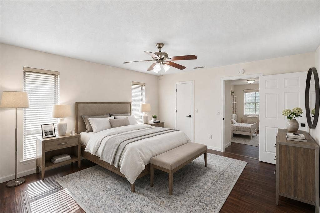 3624 Churchill Lane, Plano, TX 75075 The spacious primary bedroom offers abundant natural light and ample room for a complete furniture arrangement.Virtually Staged -- original image may have been altered by AI.