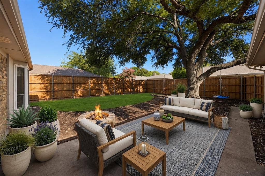 3624 Churchill Lane, Plano, TX 75075 The extended patio creates an inviting outdoor living area beneath the canopy of a beautiful mature shade tree.Virtually Staged -- original image may have been altered by AI.
