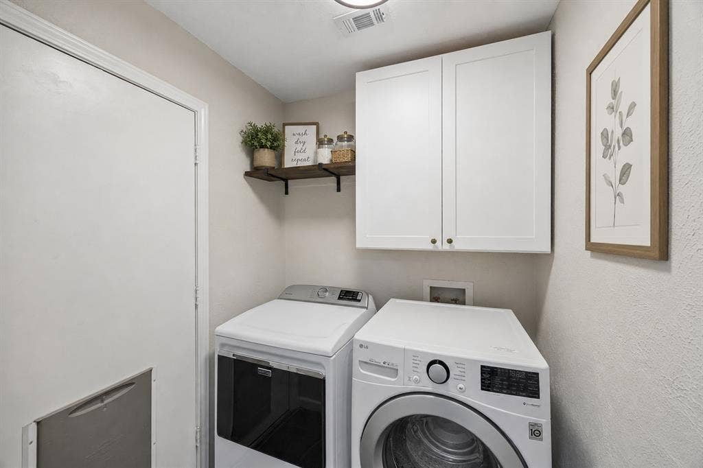 3624 Churchill Lane, Plano, TX 75075 The dedicated laundry room includes upper cabinetry and shelving to keep everyday supplies organized and within reach.Virtually Staged -- original image may have been altered by AI.