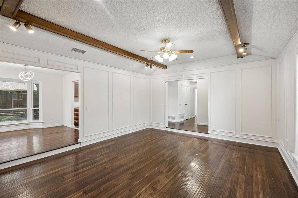 3624 Churchill Lane, Plano, TX 75075 This alternate view highlights the family room’s generous proportions, hardwood flooring and connection to the adjoining spaces.