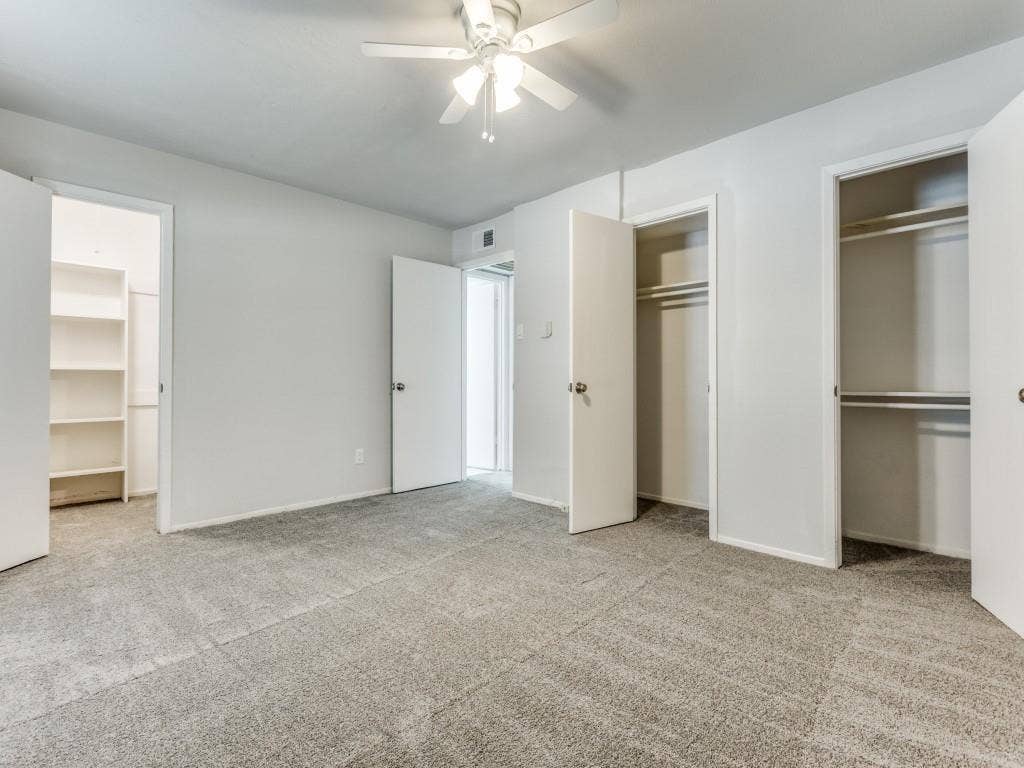 12888 Montfort Drive, #155, Dallas, TX 75230 Spacious room featuring light gray carpeting and white walls