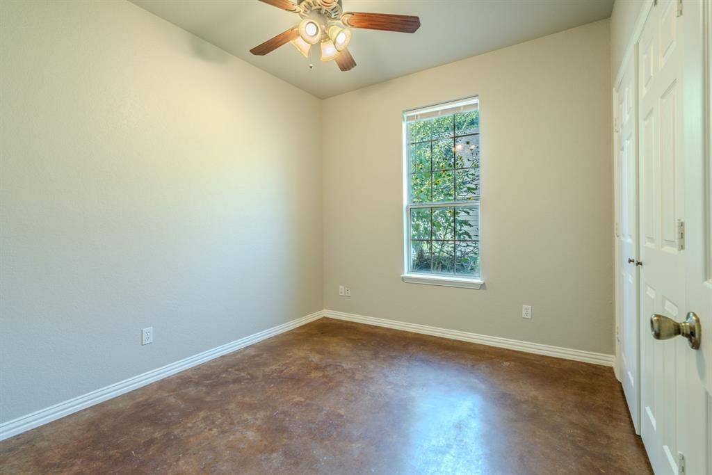 403 Summer Tree Lane, Springtown, TX 76082 Bedroom featuring a ceiling fan and fresh paint