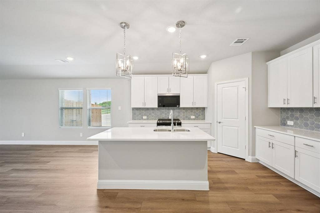 6201 Castamere Drive, Princeton, TX 75071 Photo is not of the actual home, but is an inspirational photo of builder’s model home and may depict options, furnishings, and/or decorator features that are not included.