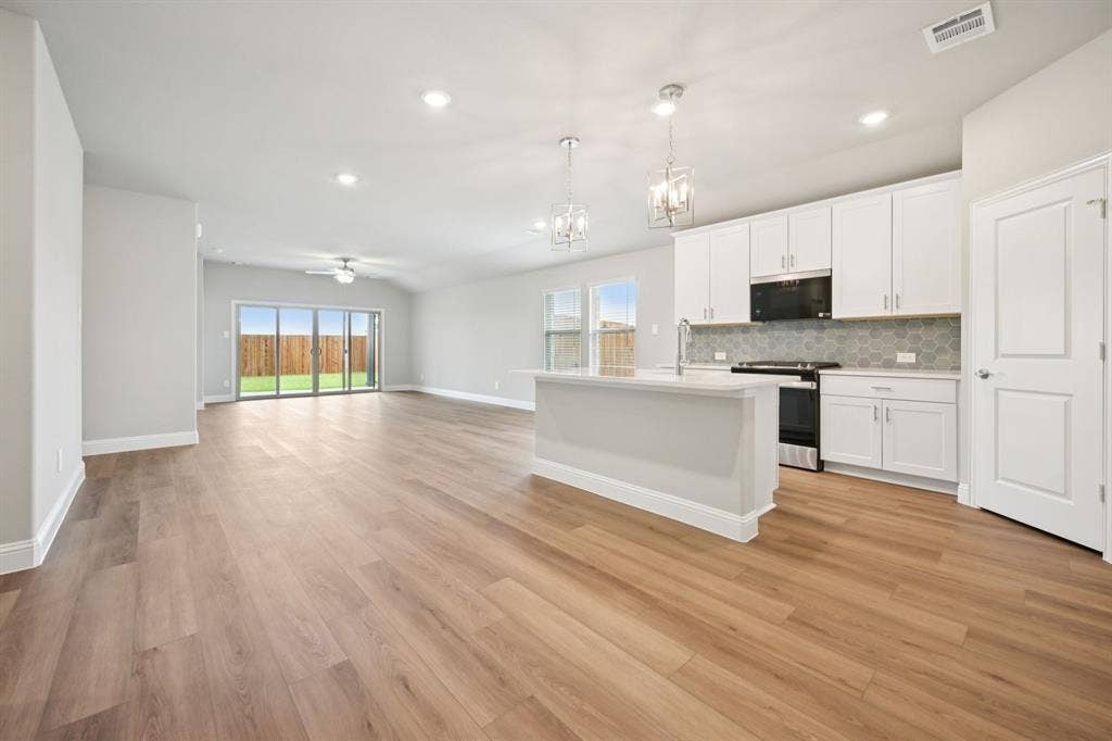 6201 Castamere Drive, Princeton, TX 75071 Photo is not of the actual home, but is an inspirational photo of builder’s model home and may depict options, furnishings, and/or decorator features that are not included.