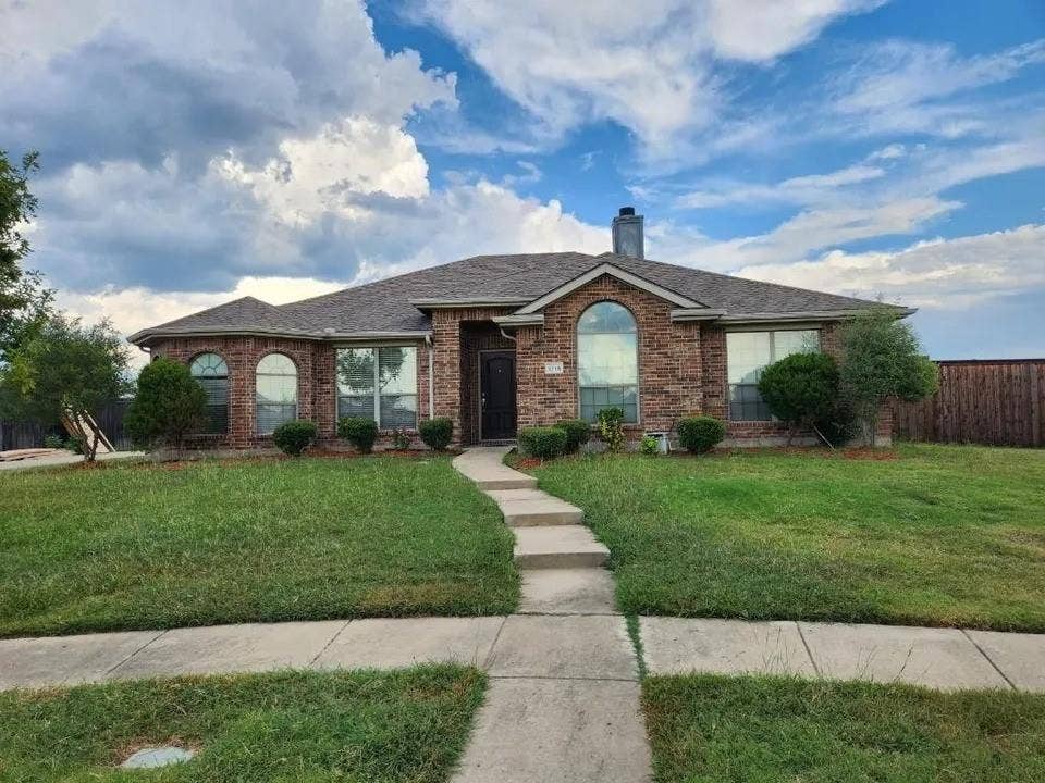 1214 Alabama Court, Murphy, TX 75094 Brick veneer facade featuring arched windows