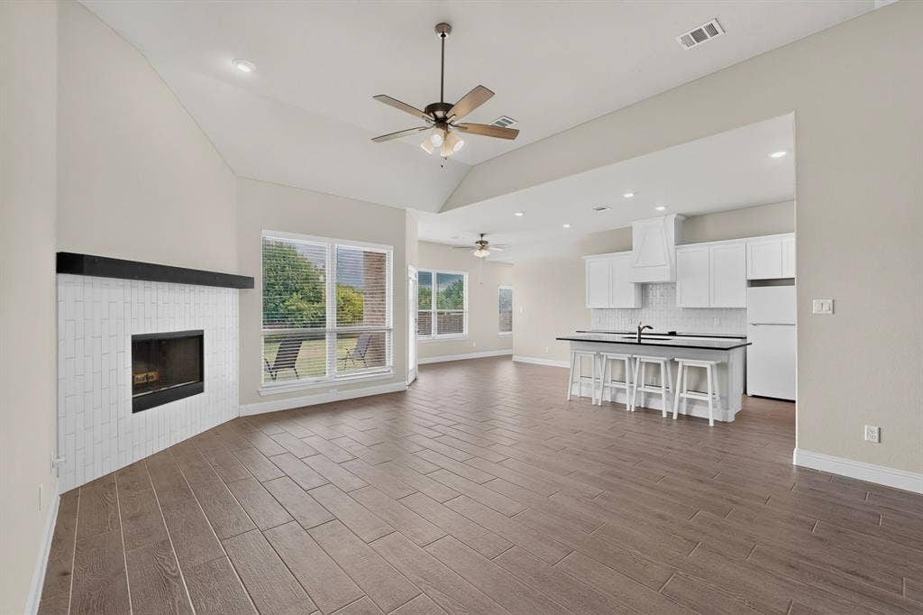 690 Serenity Lane, Red Oak, TX 75154 Note Fireplace and open concept