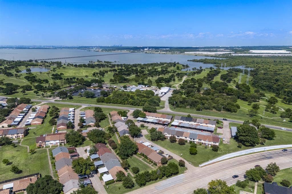 1 E Mountain Lane, #33, Grand Prairie, TX 75052 Aerial perspective showcasing a residential community