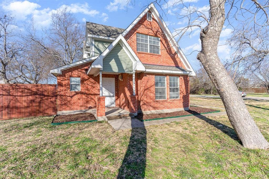 500 S Ballard Avenue, Wylie, TX 75098 Brick exterior with a peaked roofline and gabled accent